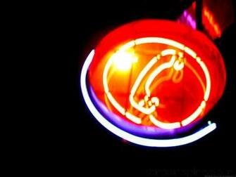 Wallpaper Neon A Phone Shaped Sign On The Streets Of