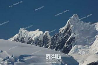 Glacier Covered Melchior Islands With Peaks Of Brabant Island In