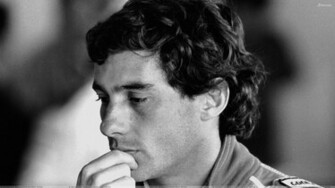 Ayrton Senna Side Pose In Black And White Picture Wallpaper