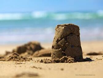 Sand Castle On Beach Background Wallpaper Pixels