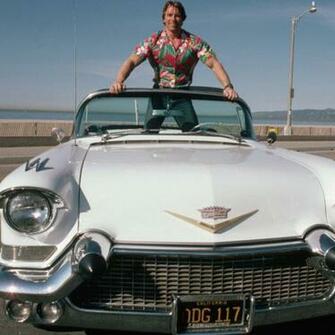 Arnold Schwarzenegger In Car Wallpaper Apple iPad Air