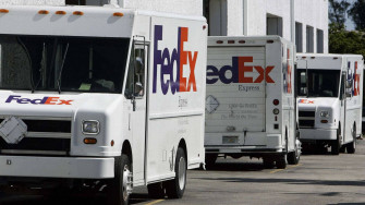 Fedex Tracking Vehicles Parked 04fg6asikiyoxqnm Wallpaper