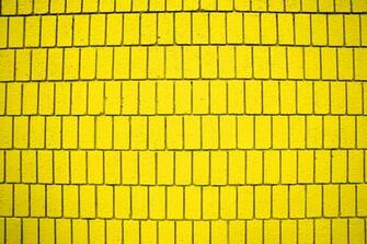 Bright Yellow Brick Wall Texture With Vertical Bricks Picture