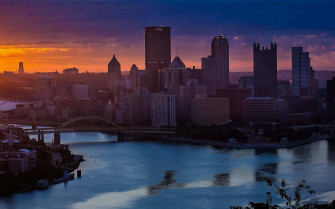 Pittsburgh Skyline And River At Sunset Wallpaper