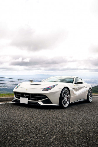 This White Ferrari iPhone Is Perfect For The Luxury Lover Wallpaper