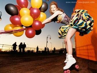 Kylie On Roller Skates Skating Wallpaper