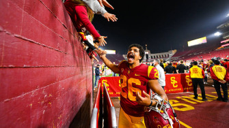 Usc Football Player And Fans Wallpaper