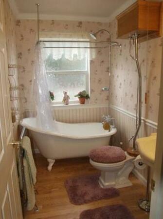 Bathroom Tile Ideas With Floral Pattern Wallpaper And White Beadboard