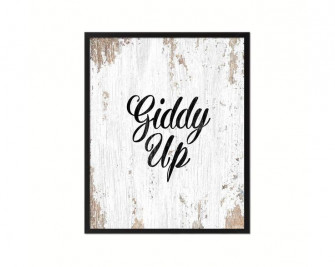 A White And Black Sign That Says Giddy Up Wallpaper