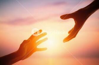 Giving A Helping Hand On The Background Of Dawn Royalty