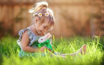 Child Girl Playing With White Rabbit Wallpaper
