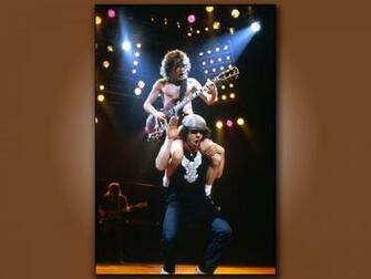 Brian Johnson Carries Angus Young Wallpaper