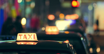 Many Taxi Cars In Hong Kong Downtown At Night Abstract City