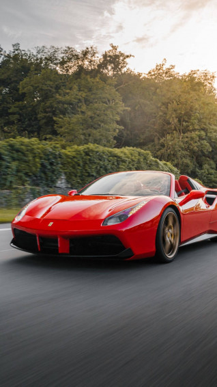 Red Italia Ferrari Phone On Road Wallpaper