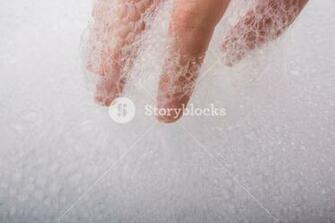 Hand Washing And Soap Foam On A Foamy Background Royalty