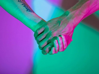 A Couple Holding Hands Wallpaper