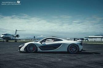 Awesome White Mclaren P1 Race Mode Side Jet Background