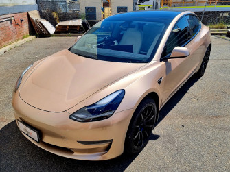 Dipz A White Tesla Model Dazzles In Champagne Gold