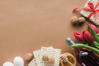 Top Of Matzah Wine And Honey On Brown Table Passover