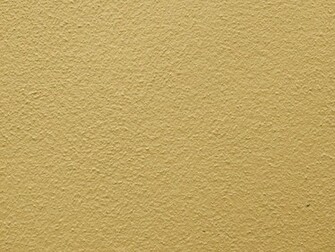 Cream Wall Surface Coloured Textured