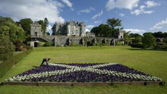 Castle With Scottish Flag In Flowers HD Wallpaper