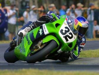 Eric Bostrom Sports Wallpaper Image Featuring Motorbike Racing