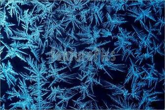 Picture Of Frost Formations On A Window With Dark Background