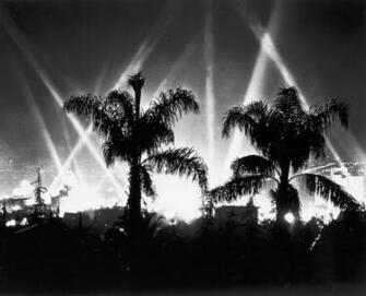 Hollywood Hills Spotlights Can Be Seen In The Background As