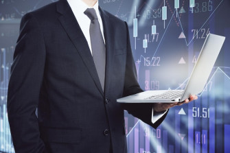 Businessman Holding Laptop Office Corridor Trading Raising Chart Background Closeup Stock Market Concept Wallpaper