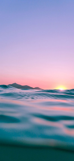 Calm Body Of Water During Golden Hour iPhone Wallpaper