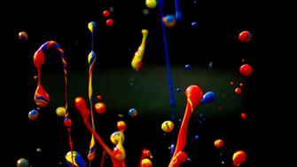Flying Paint Splatters Wallpaper