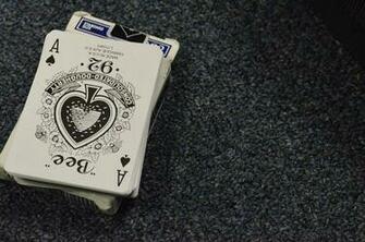 Black And White Deck Of Cards On Background By Kevin Pham