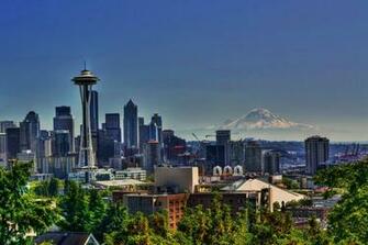Pictures The Seattle Space Needle With Mount Rainier In Background