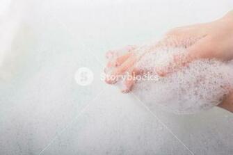 Hand Washing And Soap Foam On A Foamy Background Royalty