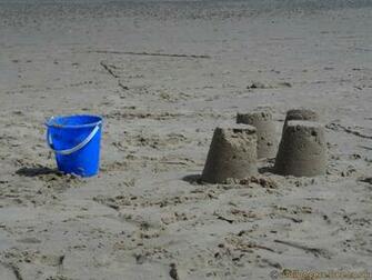 Sand Castles And Bucket Nature Wallpaper Featuring Beaches