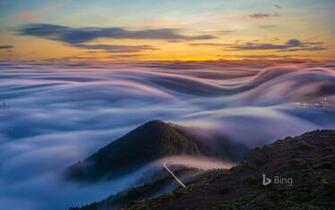 Clouds Flowing Over The Mountains Of Tenerife Canary Islands