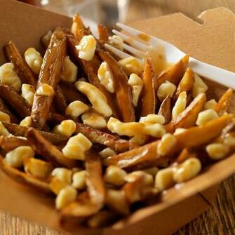 Vive La Poutine The Origins Of Quebec S Favorite Snack Food Wine