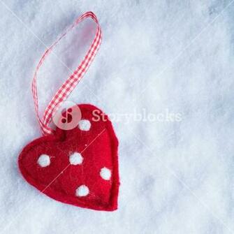 Red Toy Suave Heart On A Frosty White Snow Winter Background
