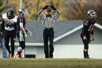HD Wallpaper Referee Making Hand Gesture Between Football Players