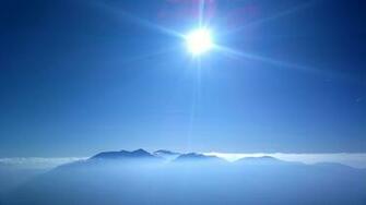 Sunlight Clouds Mountain Blue Sky Haze Wallpaper Background