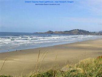Sandy Beach From Top Of Tall Sand Dune See Small People On