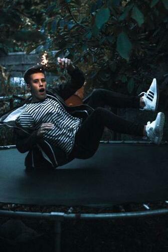 HD Wallpaper Man Jumping On Black Trampoline Sparkler Boy