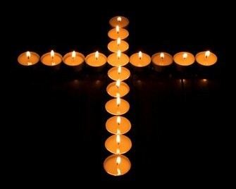 Crucifix Candle Wallpaper Stock Photos