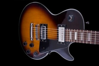 Sunburst Guitar On Black Background By Nick Jay