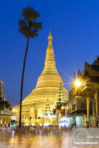 Sunset At Shwedagon Pagoda In Stock Photo