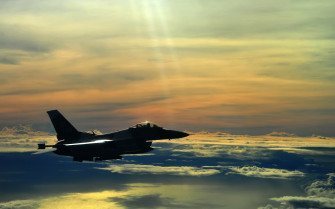 Stunning HD Wallpaper Of A Military Jet Fighter In Flight