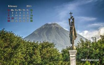 Agua Volcano Background And Hermano Pedro Statue Foreground
