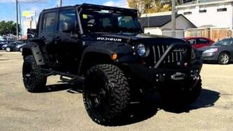 Lifted Jeep Wrangler Mudding Rubicon White