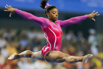 Simone Biles Performing A Perfect Balance Beam Routine