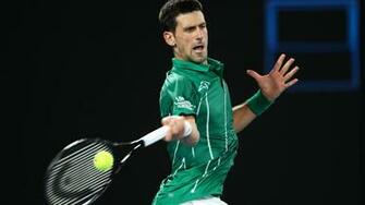 Australian Open Novak Djokovic Overcomes Wobble To Progress